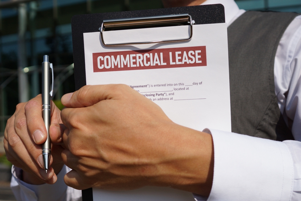 Commercial Lease Agreement is shown as business and financial concept